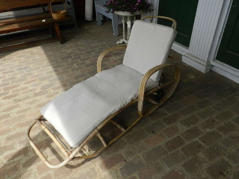 Bamboo framed lounger, circa 1970 with original cushion which has new cotton cover.
