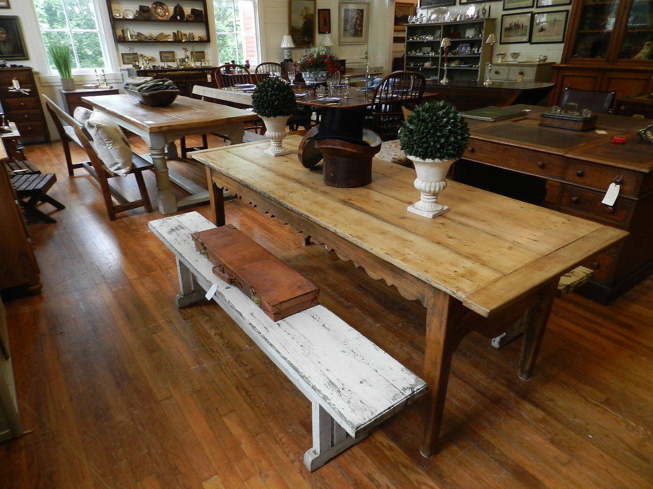 French pine farm table with straight tapering legs and shaped apron.The table has a cutlery  drawer in one end.