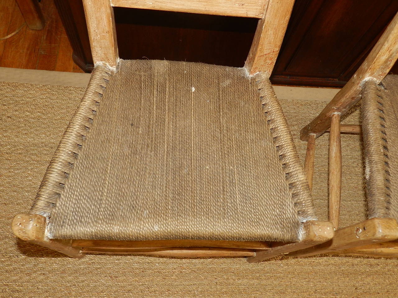 Pair of handmade Scottish island chairs with rope seats.
