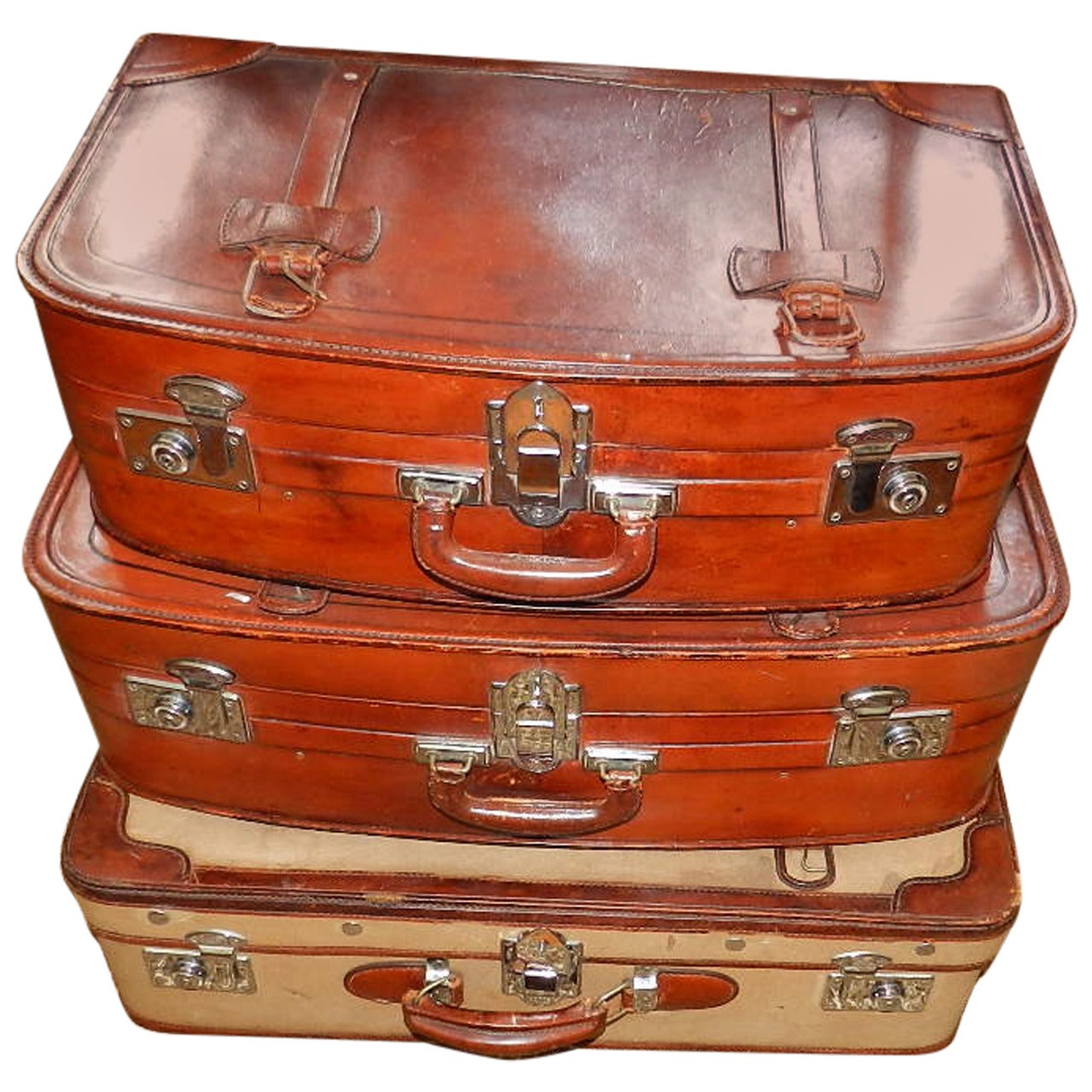 Set of Leather and Canvas Suitcases For Sale