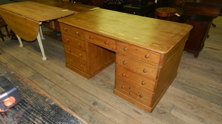 An Antique Pine Partner's Pedestal Desk