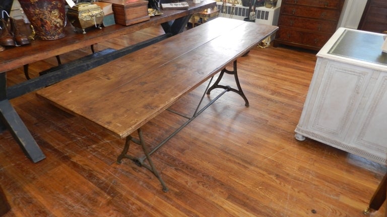 Custom-made sofa table with cast iron base and hard wood top