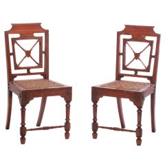 A Pair of English Arts and Crafts Chairs