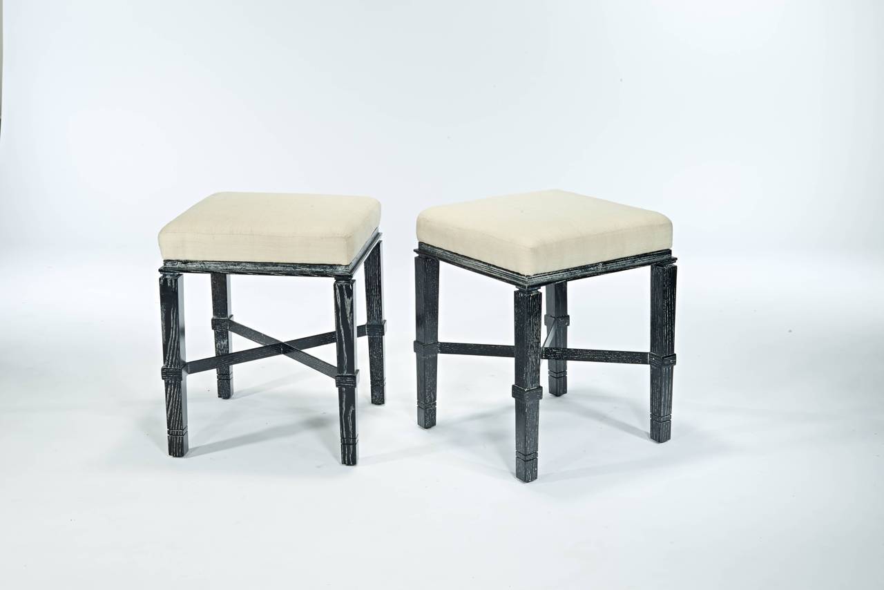 A great pair of documented Haines stools in silver fox finish with silk upholstery.