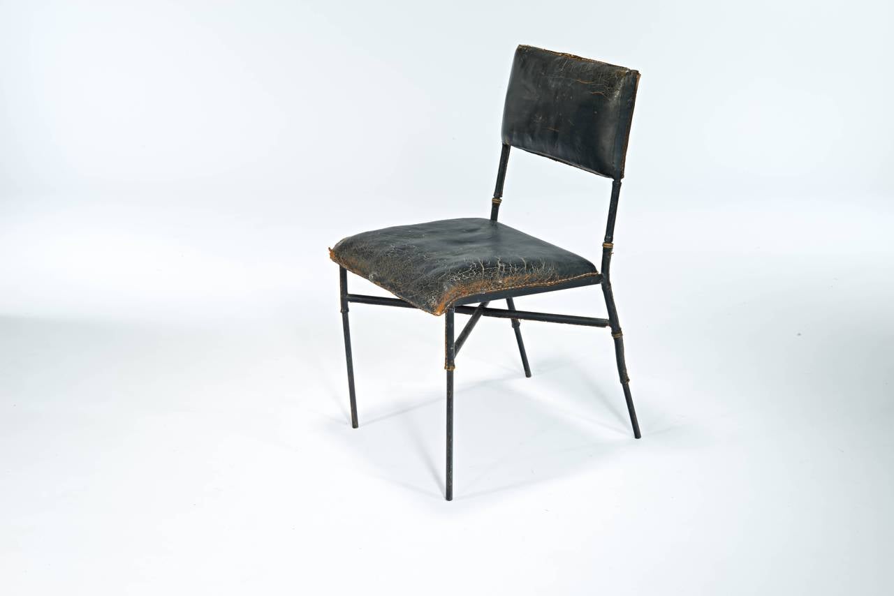 You just can't make them like this...

Spectacular distress and patina on this adorable Adnet chair.