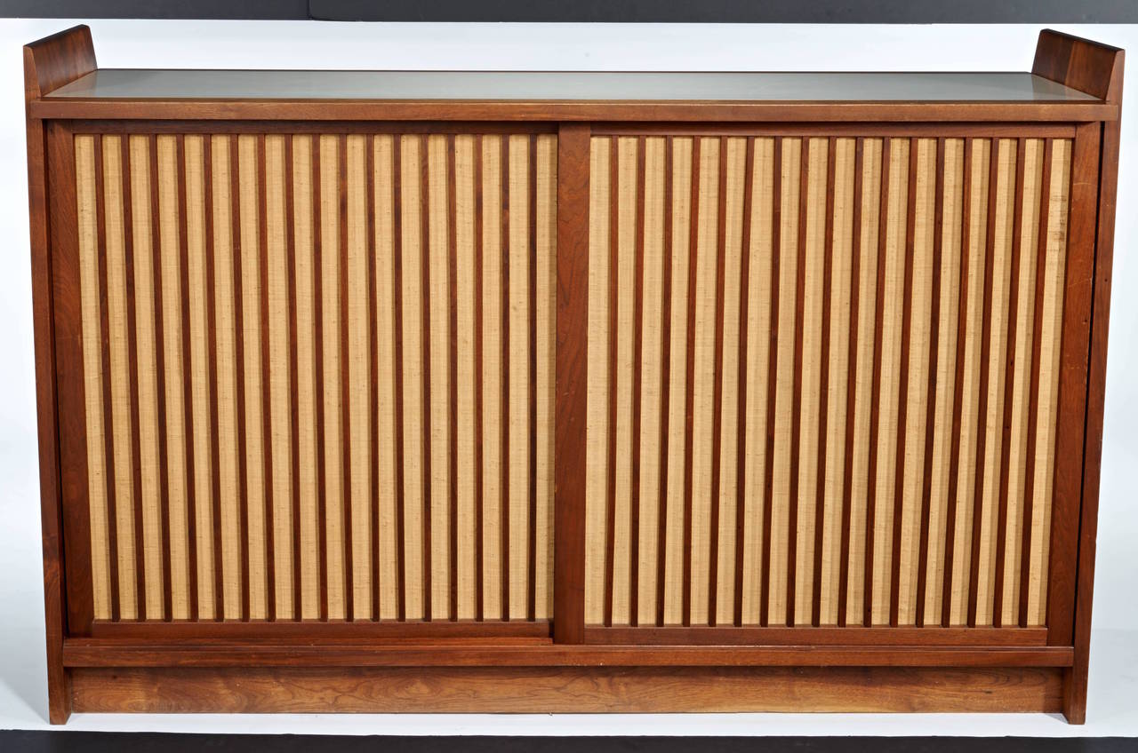 George Nakashima dry bar with pandanus front. A rare form.