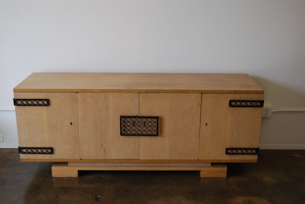 Beautiful Jean Royère cabinet, oak with iron hardware. Fully documented. Provenanace available.