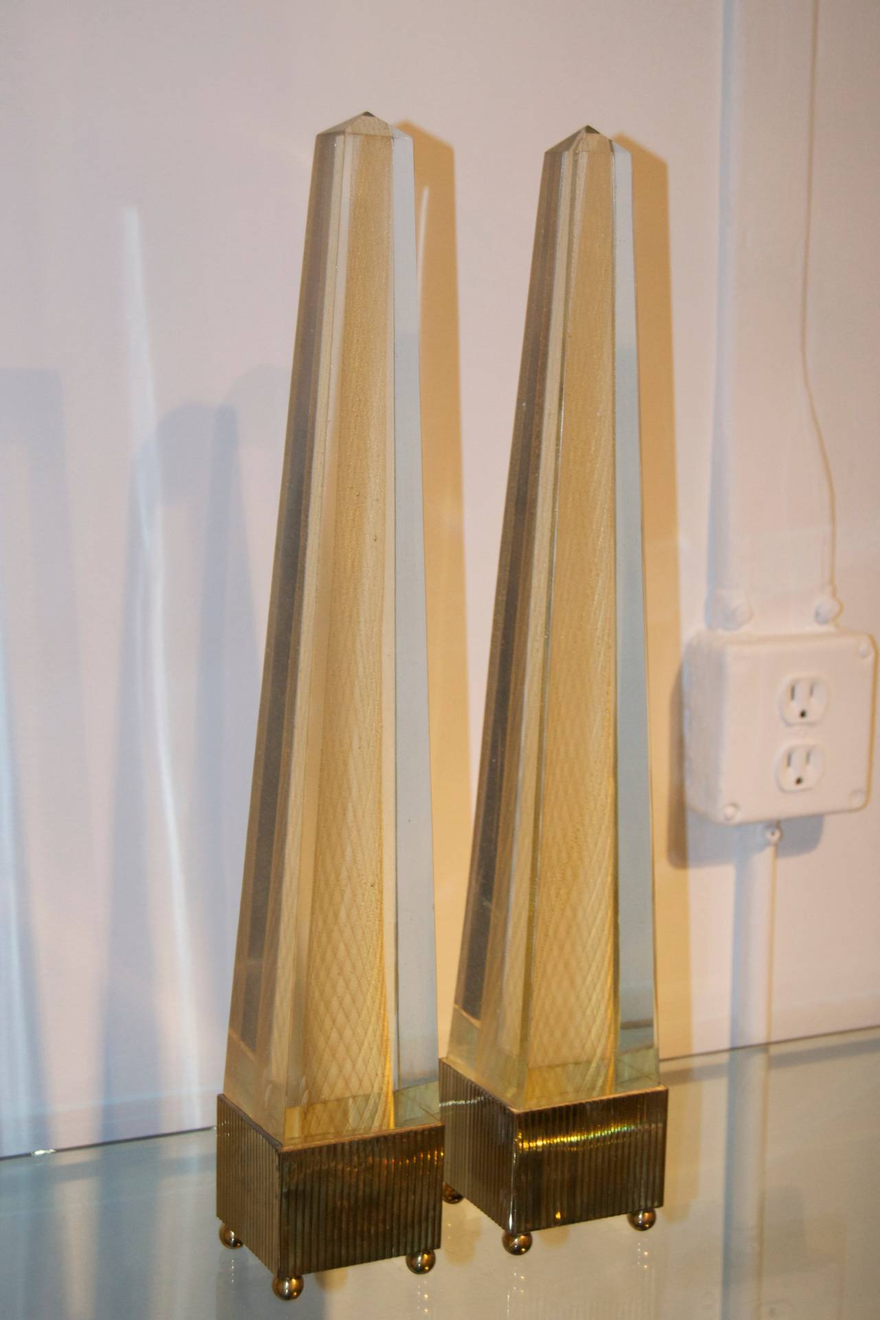 An amazing matched pair of Venini obelisks.