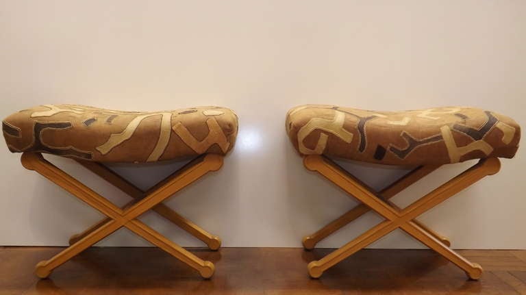 Lovely X stools in the style of Andre Arbus, with African tribal cloth upholstery.