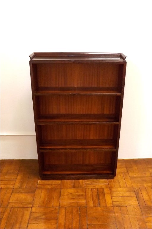 A beautiful Adnet bookcase in rosewood. Branded J Adnet on verso.