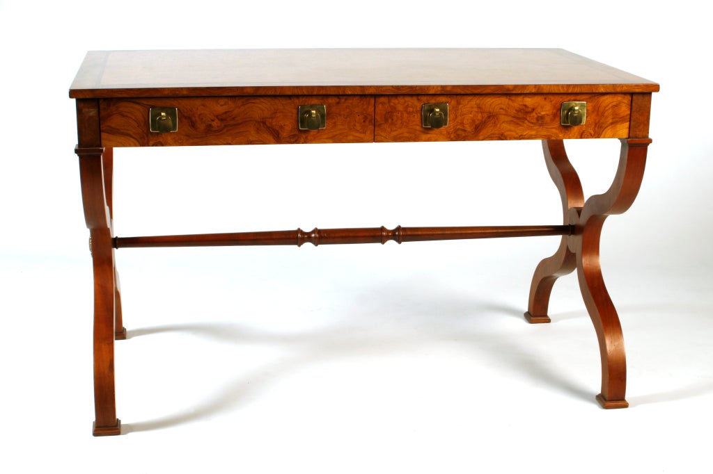 Beautiful French Provincial desk by Baker in olive burl with tab brass pulls.