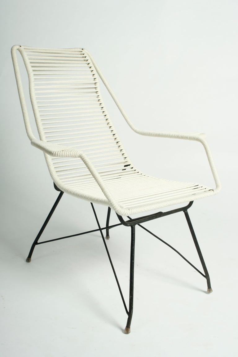 Pair of Brazilian Martin Eisler lounge chairs with cord wrapped seats, back and arms.