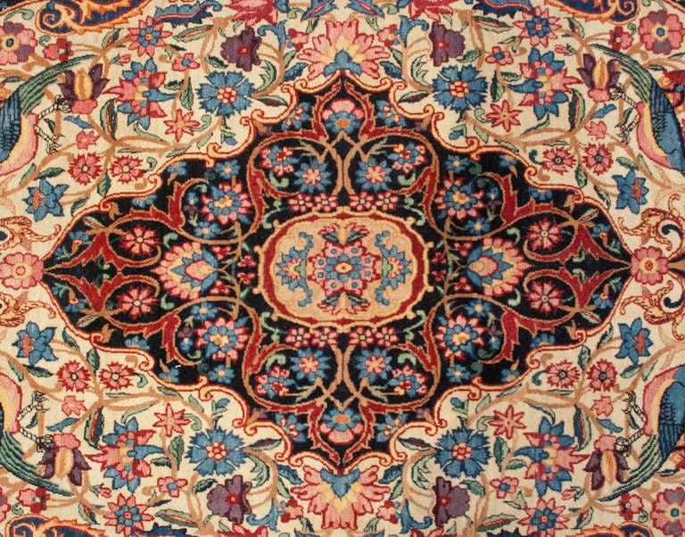 An exceptional 19th century Persian Lavar rug with amazing intricately woven pattern depicting birds amidst a 