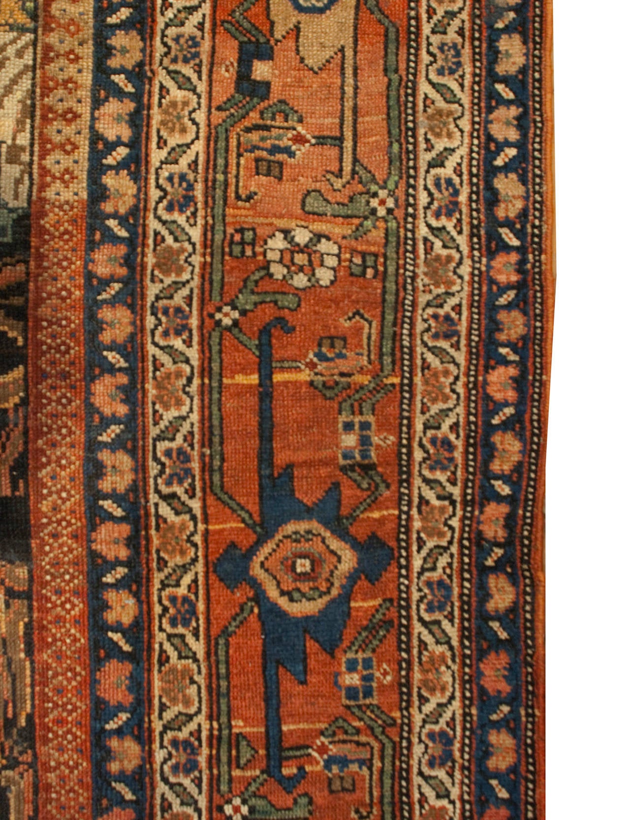 A wonderful 19th century Persian Karabagh runner with a beautifully woven floral central field, surrounded by multiple complementary floral borders.