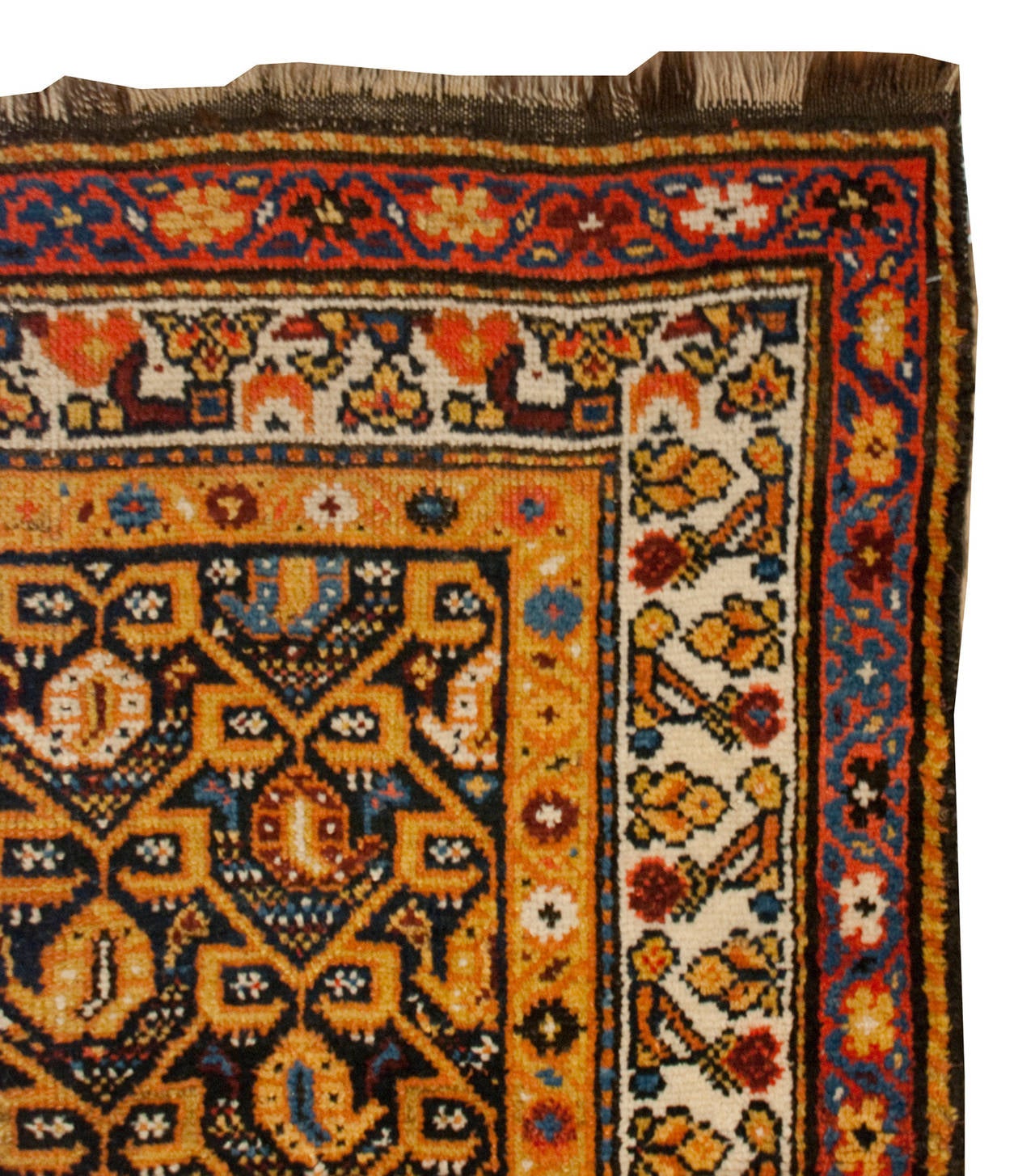An early 20th century Persian Lori runner with a multicolored paisley pattern with a brilliant gold latticework pattern, surrounded by multiple complementary floral borders.