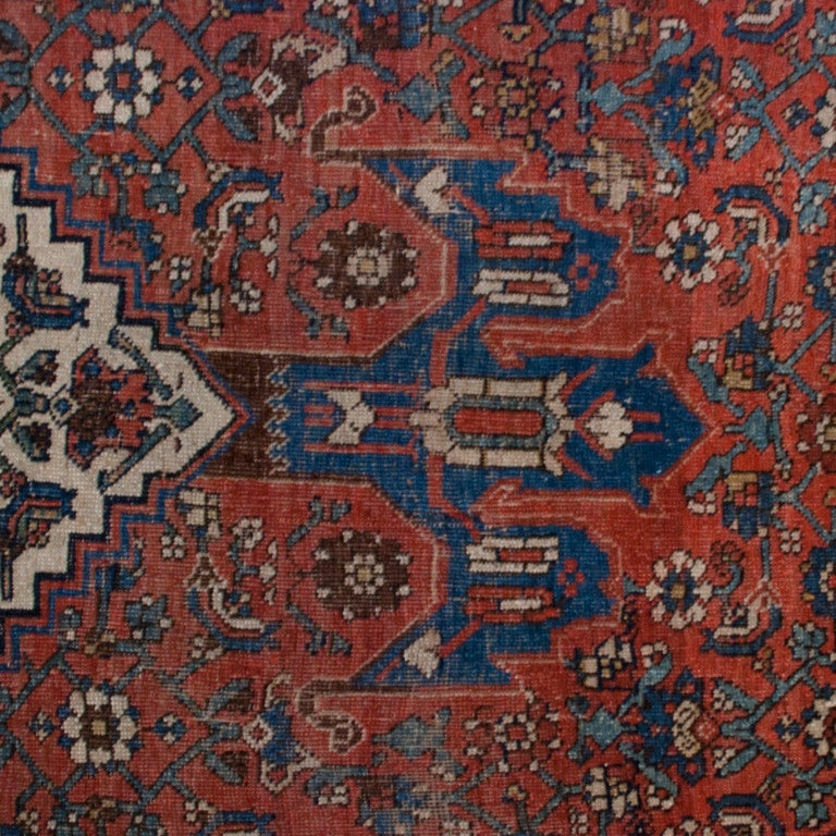 A 19th century Persian Bidjar carpet with all-over floral pattern and large diamond shaped central medallion surrounded by a contrasting floral border.

Measures: 12'x 8'.


Keywords: Rug, carpet, textile, Persian, Azeri, Heriz, tribal, Central