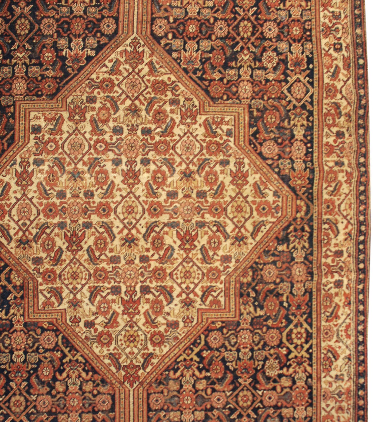 An elaborately woven 19th century Persian Bibikabad runner with large central diamond medallion with a floral lattice pattern on a similar but contrasting floral lattice background surrounded by multiple complementary floral borders.