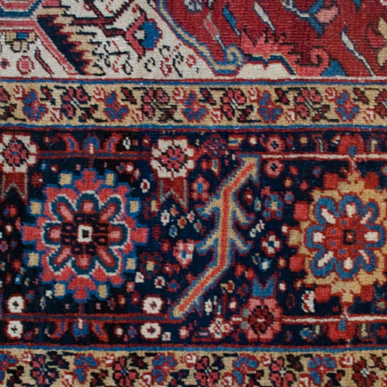 An early 20th century Persian Heriz carpet with elaborate central medallion amidst a field of vines, surrounded by a contrasting floral border.

measures: 10' x 13'.


Keywords: Carpet, rug, Oushak, Perisan, Heriz, Tabriz, Bahkshaish,