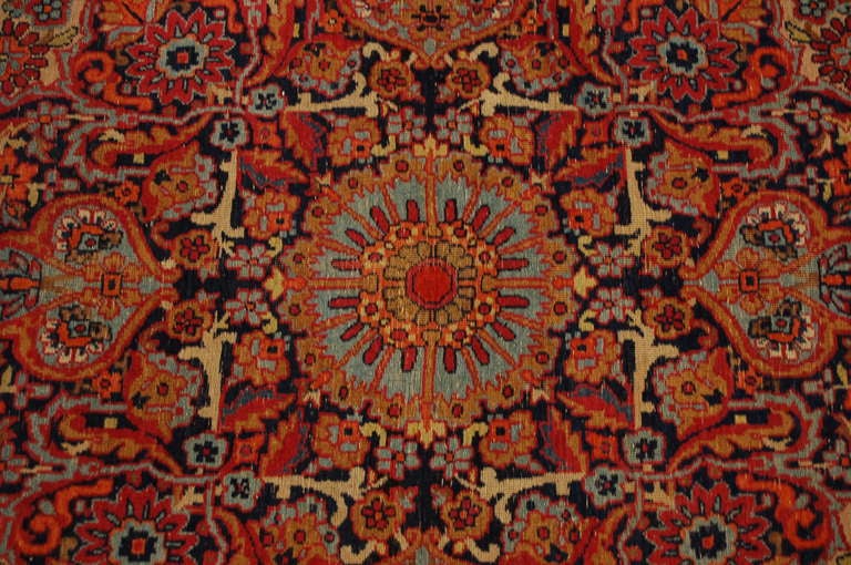 An amazing antique, late 19th century, Persian Lavar Kirman rug, approximately 400 knots per square inch, with unbelievably densely woven and intricate floral patterns, surrounded by multiple complementary floral borders.

Measures: 4'9