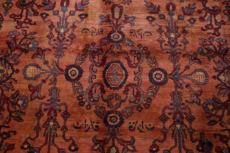 A late 19th century Persian Kirman rug with an all-over tree-of-life pattern on a beautiful salmon background, surrounded by a contrasting floral border.

         

Keywords: Rug, carpet, textile, Serapi, Tabriz, Heriz, Kirmanshah, Bakshaish,