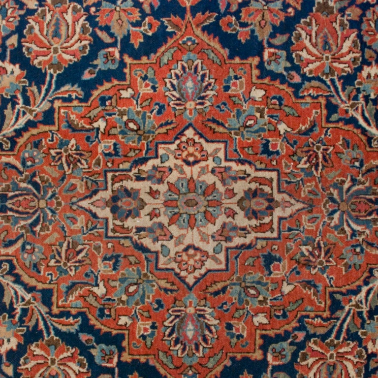 An early 20th century Persian Kashan carpet with highly elaborate floral medallions surrounded by a alternating floral border.



Measures: 9' x 12'.





Keywords: Rug, carpet, textile, Persian, Azeri, Heriz, tribal, Central Asian,