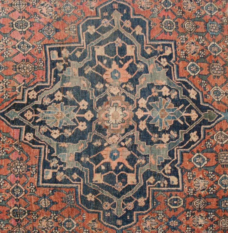 An amazing 19th century Persian Bidjar rug with intricately woven floral pattern with a central geometric diamond medallion on a crimson background surrounded by multiple contrasting floral borders.

  

Keywords: Rug, carpet, Khotan, Samarkand,