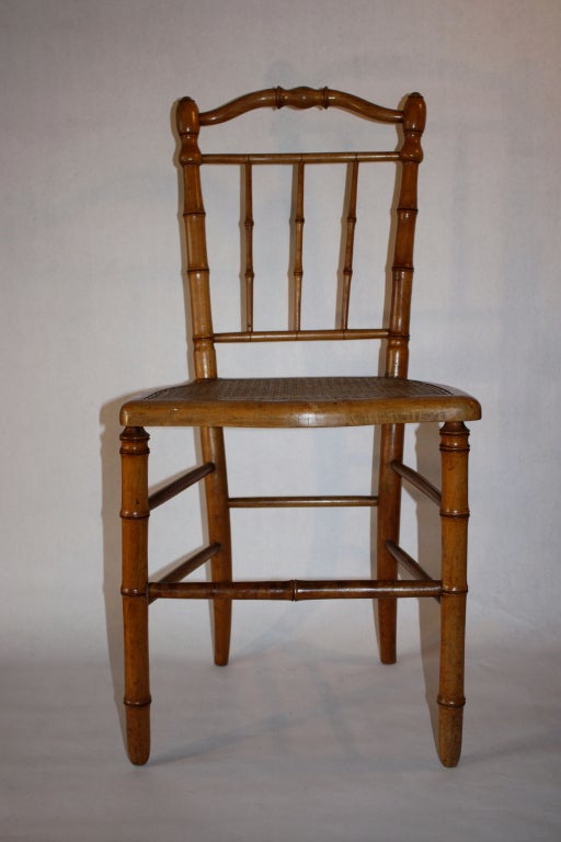 Set of 4 bamboo chairs with cane seat from France.