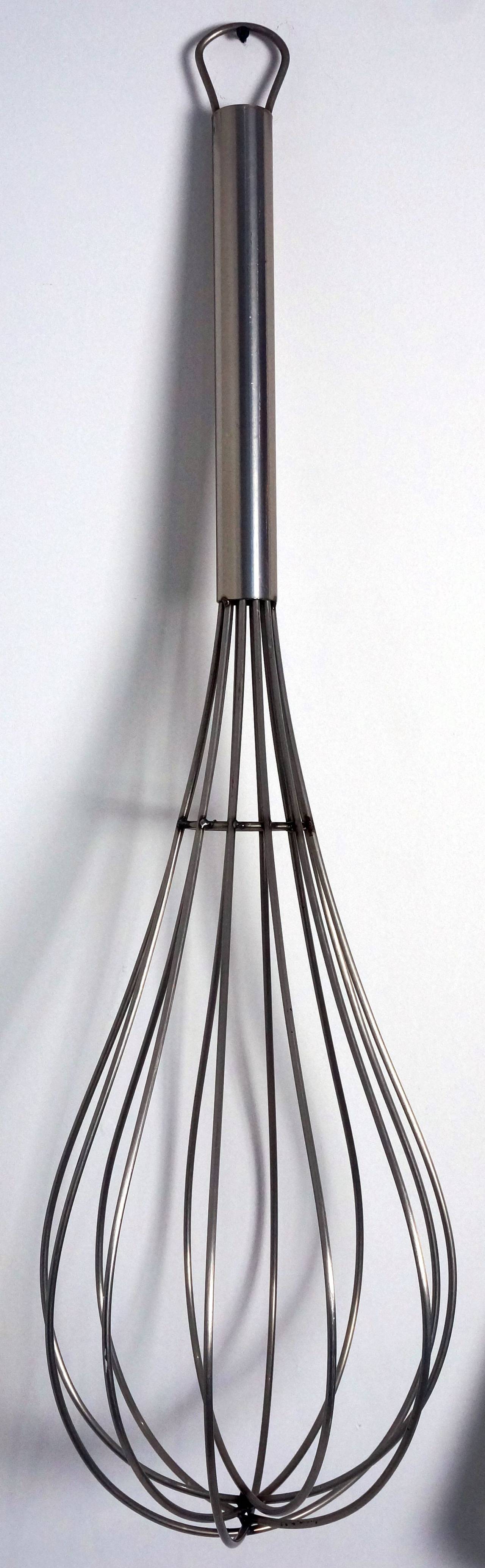 This stainless steel, over-scaled, wall-hung utensil sculpture of a whisk was created in 2000 by Curtis Jere.

For best net trade price or additional questions regarding this item, please click the 