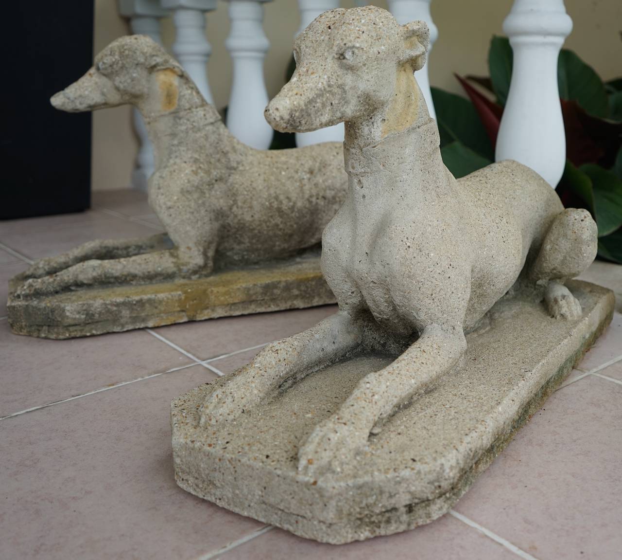 This pair of Whippets are of cast-stone and were made in England in the late 19th to the early 20th century.  They will make the perfect balance to the entry way of your home or a special place in the garden.

Please feel free to contact us