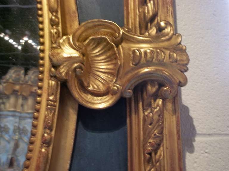 20th Century Louis XVI Style Giltwood Mirror with Floral Panels