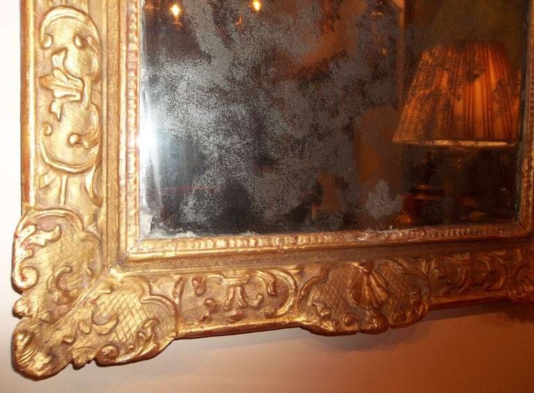 Regence to Louis XV Style Giltwood Mirror with Roman Trophy 1