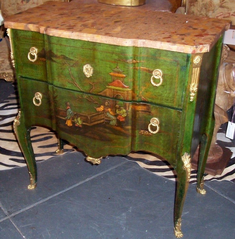 A French Louis XVI style emerald green japanned chest with chinoiserie decorations. Very well cast and chased gilt bronze mounts . Shaped and beveled marble top . Oak as secondary wood . Paper label : 

