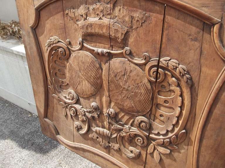 Carved And Faded French Walnut Boiserie Panel With Armorial Inset