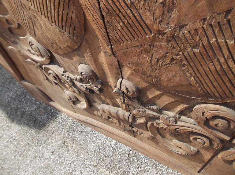 Carved And Faded French Walnut Boiserie Panel With Armorial Inset In Good Condition In Nashville, TN
