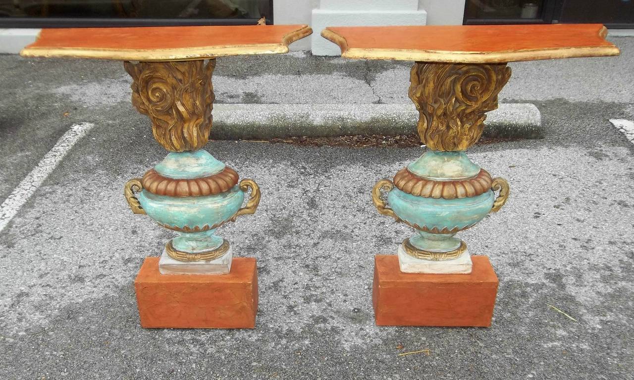 Possibly Venetian of antique elements, urn form with smoke and fire carving. The back indicates probably architectural at one point mounted to a wall or similar. Now freestanding with later bases of faux marble (terracotta color) with shimmering