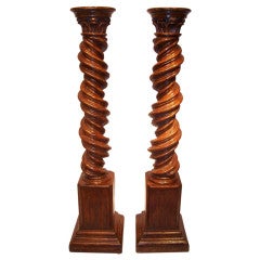 Fine Italian walnut spiral columns or torchieres