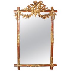 Giltwood Faux Bamboo Mirror with Cherubs or Putti Crest with Floral Garlands