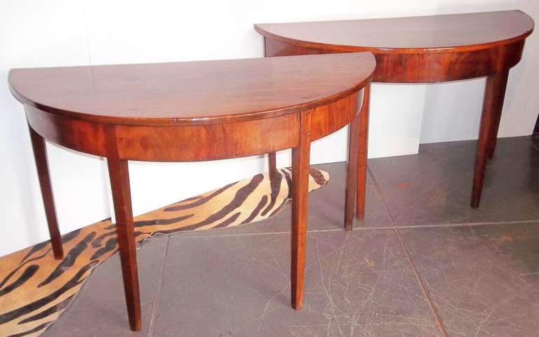 With nice irregular fading to the skirt and legs , less so to the tops (tops are solid boards of choice mahogany ) . Overall pretty brown to reddish brown color . Very good mellow patina .

With minor chips, gouges and losses, especially to edges;