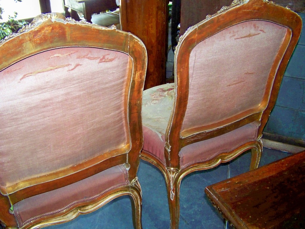 Wood Pair of Louis XV style giltwood chairs with tapestry covering