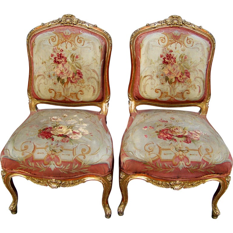 Pair of Louis XV style giltwood chairs with tapestry covering