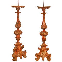 A Pair Of Italian Polychrome Prickets Or Candlesticks