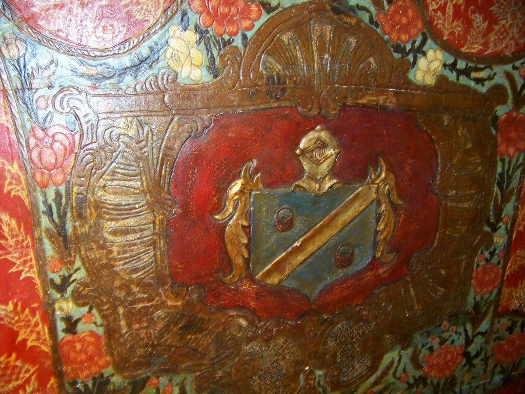 A painted headboard ( Queen bed ) carved as medieval tent , the drape pulled back to show coat-of-arms. The entire pattern,roses, fabric detail and coat-of-arms incised into the wood and then painted . After nearly 3 centuries , distressed