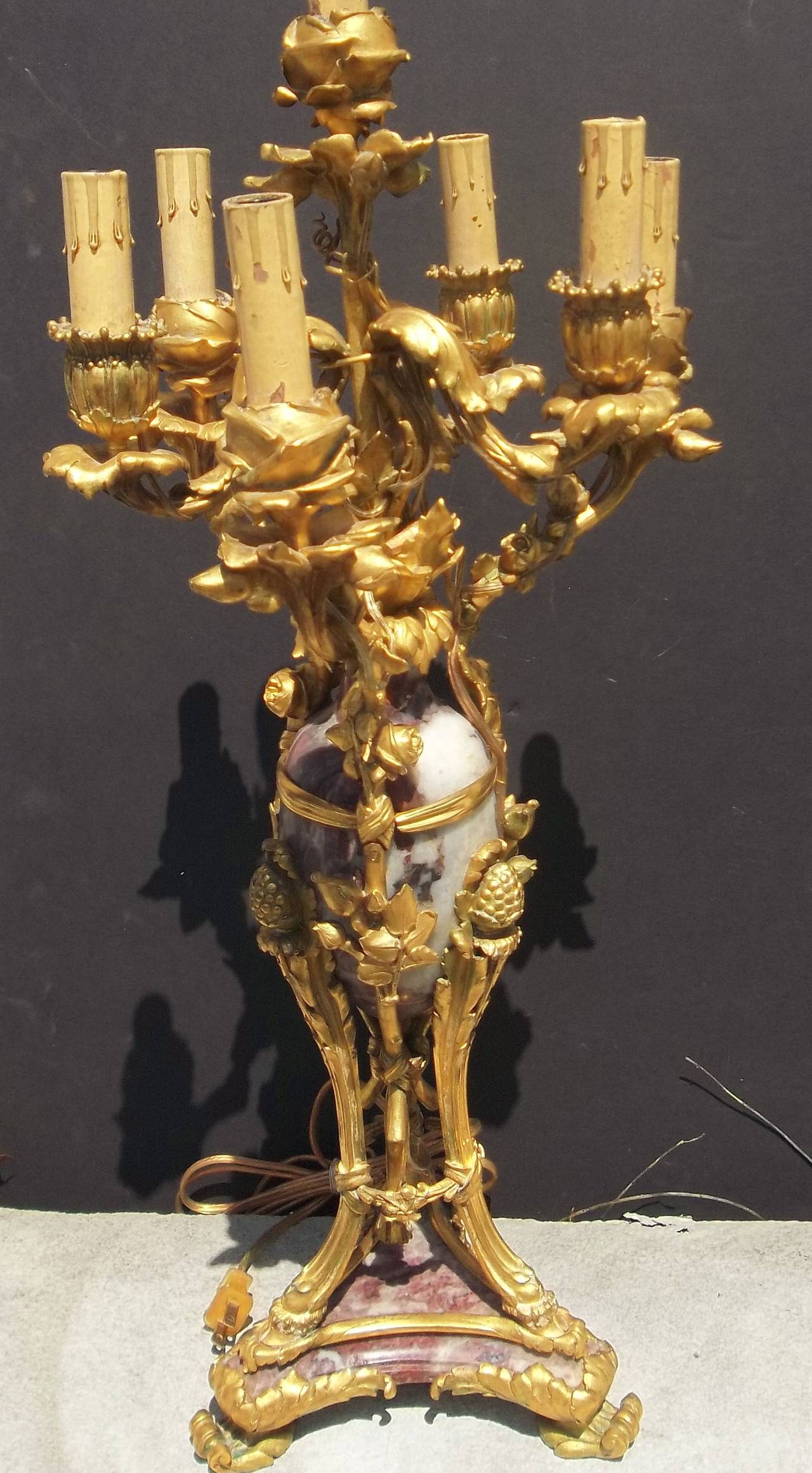 Richly cast and gilded bronze floral and foliate bronze mounts with rose blooms / buds for candle holder .Now wired as a lamp . Crack to marble dome repaired (see photo 4 ) . very detailed bronze mounts..

Beaux Arts interpretation of Louis Xv 
 