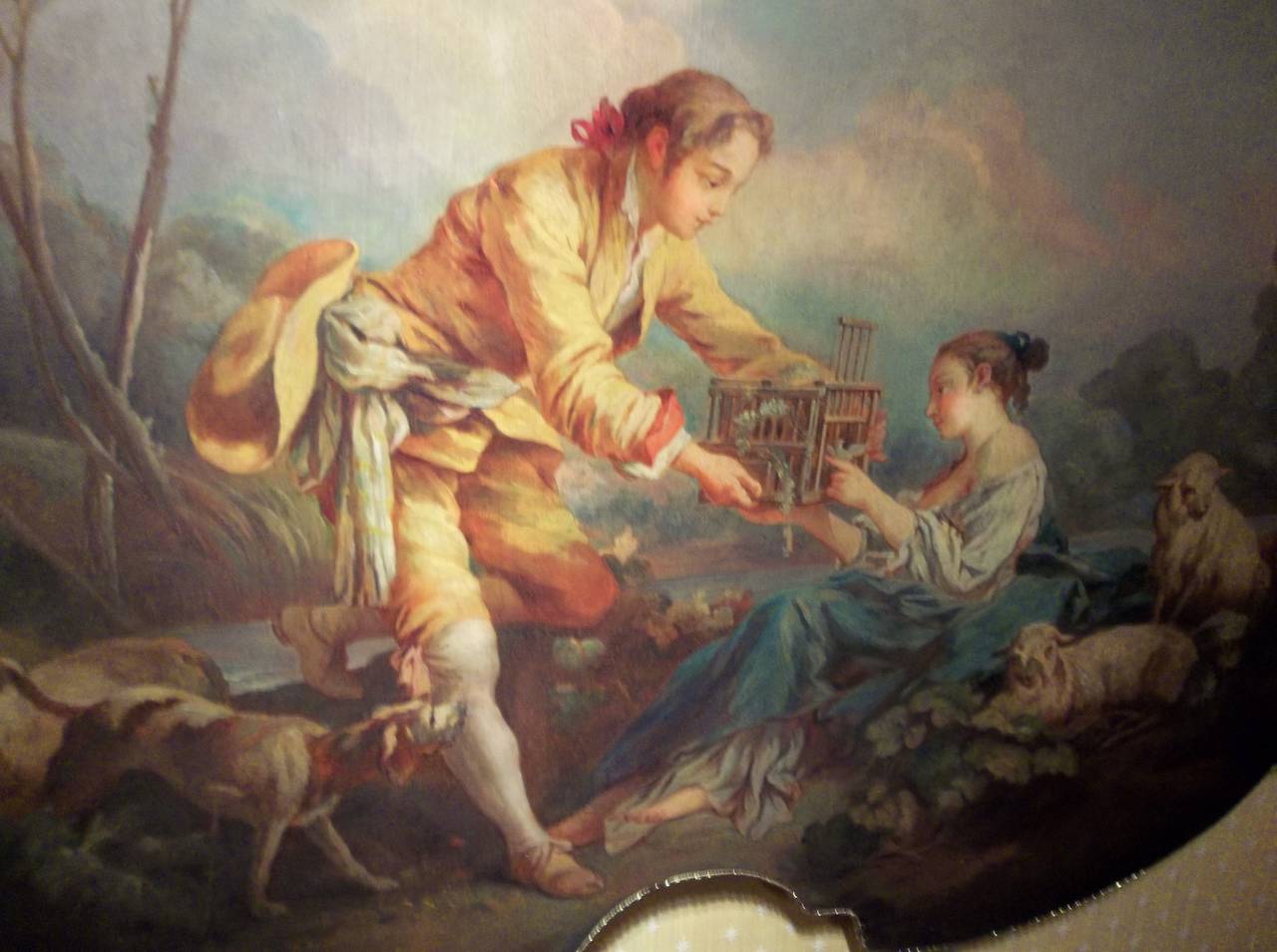 Inspired by Boucher's 4 Seasons a later rendering probably Autumn. A youth gifting lovebirds to a  maiden (shepherdess ) .Attractive child like faces.  Some light craquelure  , some puckering of the canvas at stretcher edge . At some point removed