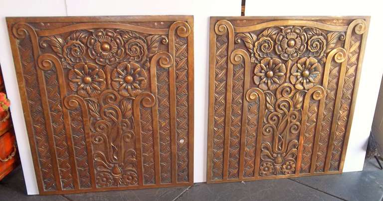 Very well cast panels with stylized flowers and stalks, circa 1925-1935. Heavy, ship weight around 150 per panel white glove delivery only. Some green verdigris on back of both. One with a very colorful rust drip that followed the pattern in reverse