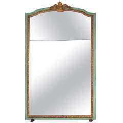 Neoclassical styled green and gilt trimmed mirror