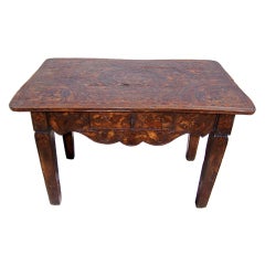 Carved and tooled Italian walnut provincial side table Carved and tooled Italian walnut provincial side table