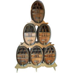 Wine cabinet or cellarette comprised of cognac or wine casks