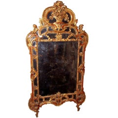 Regence - Louis XV style transitional giltwood mirror