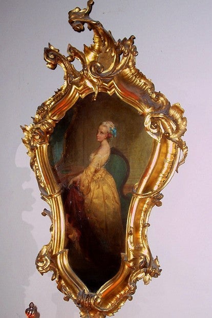 A pair of Venetian oils representing two of The Four Seasons . Oils are encased in magnificent hand carved Venetian cartouche shaped gilt frames. Lovely gilt patina and some slight bleeding of the red bole . Fall , represented by the peasant girl